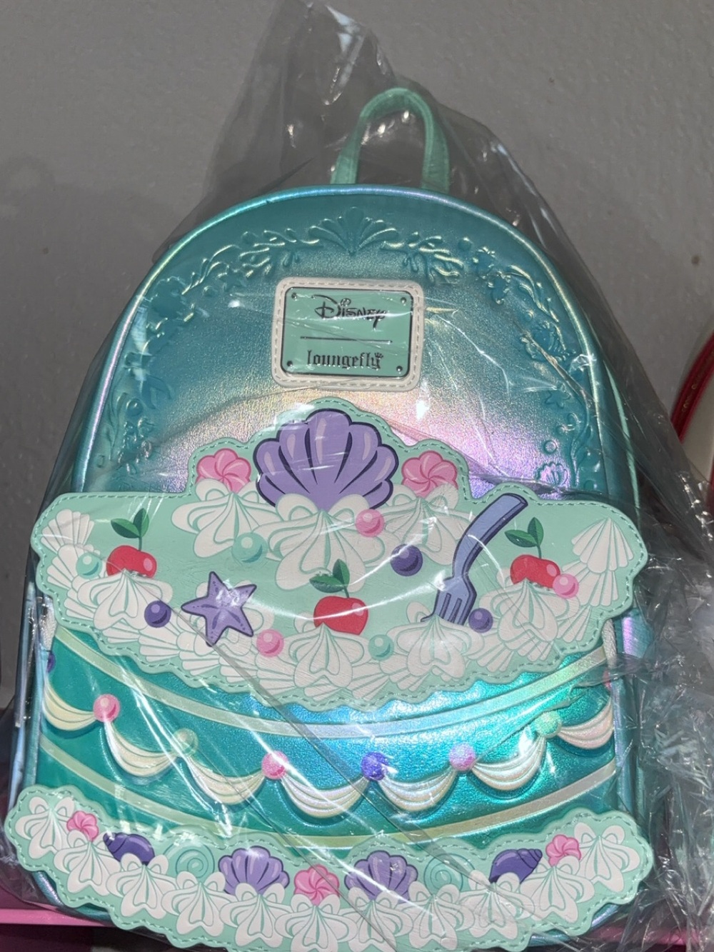 Loungefly Iridescent Aqua & Mint Ariel Seashell Cake Mini Backpack